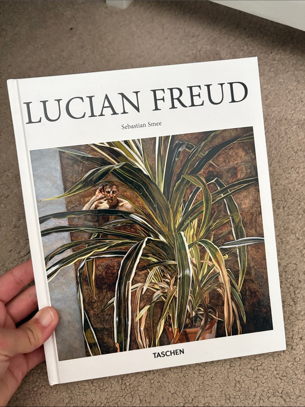 Taschen Lucian Freud Book — White Cover with Green and Brown Plant Illustration